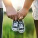 https://unsplash.com/photos/woman-and-man-holding-black-crib-shoes-standing-near-green-grass-during-daytime-7tGqLzHcjZ8